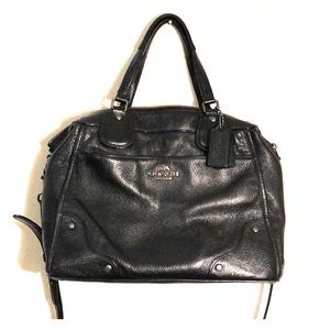 All black leather, shoulder bag, adjustable strap.